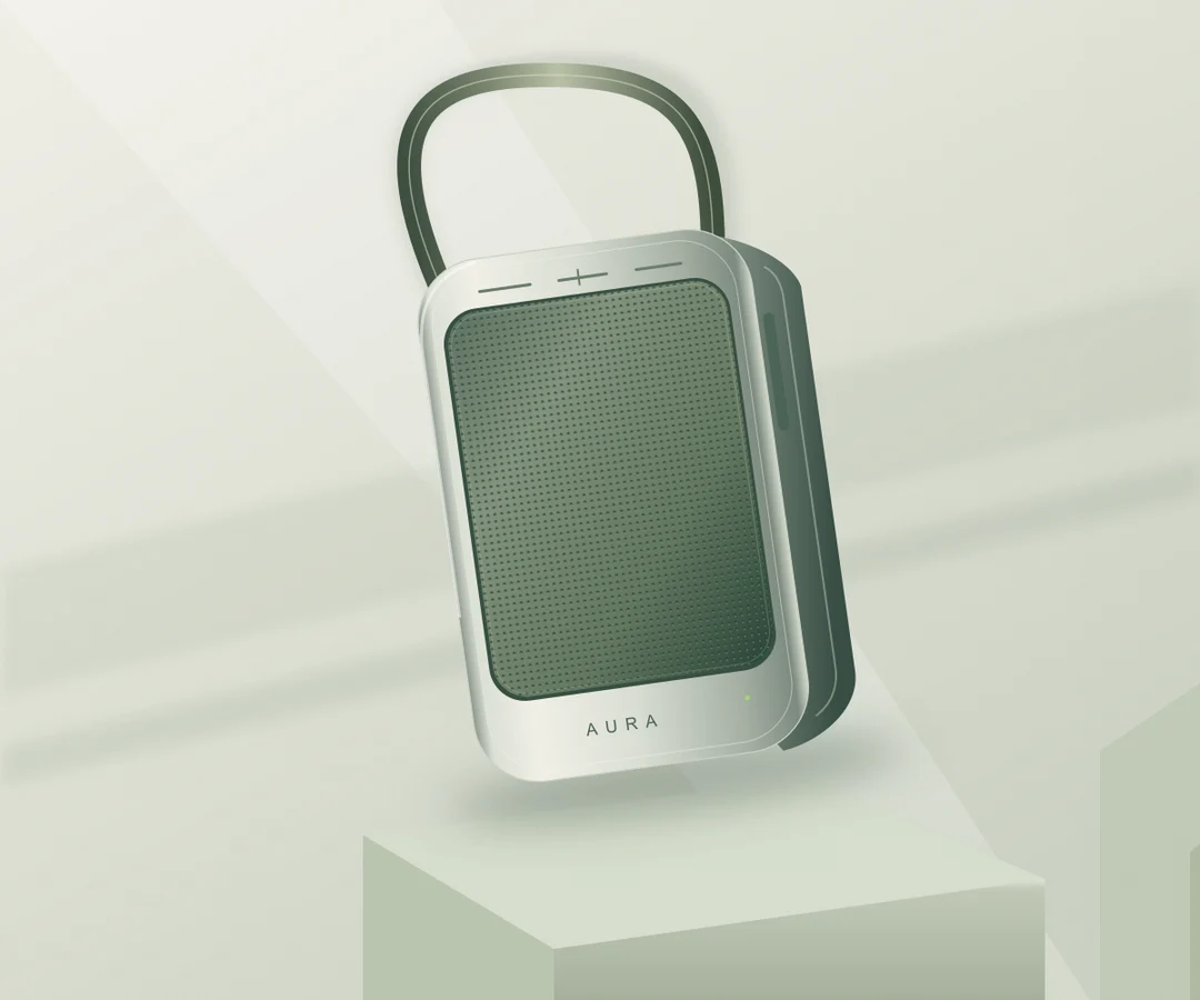 Original AURA portable speaker study, with an aluminium body and woven grille in a carefully lit setting